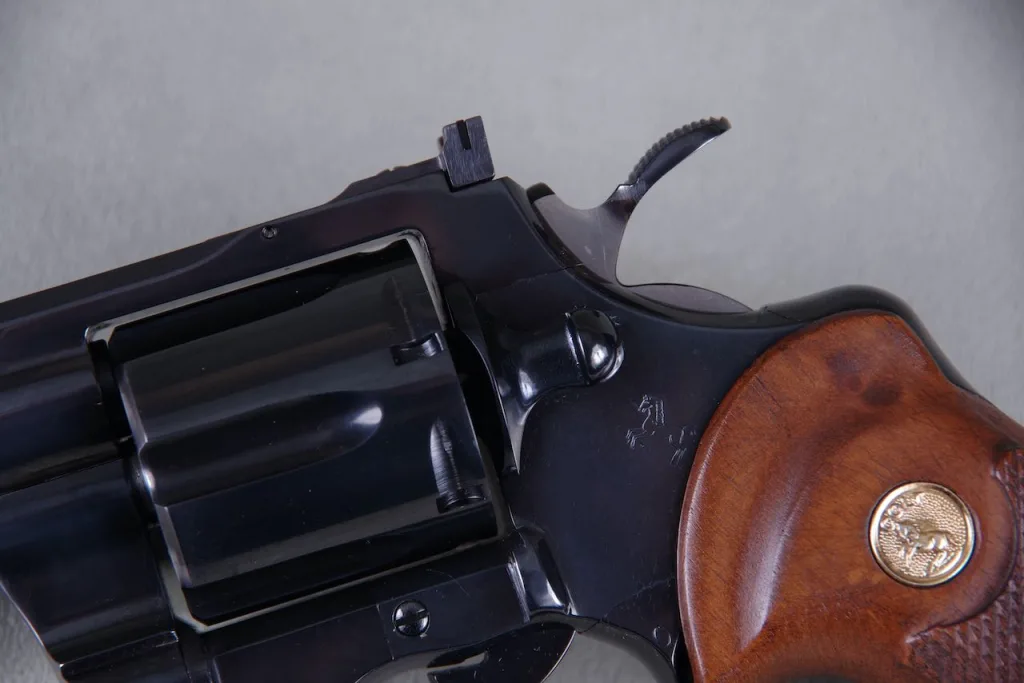Rampant Colt and Colt medallion on a 1968 Colt Python Revolver